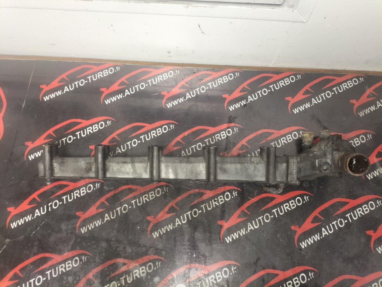 RAMPE COLLECTEUR THERMOSTAT  JEEP GRAND CHEEROKE WJ 3.1 TD 91282615F